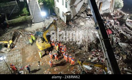 Tongling City, China. 27th May, 2024. A drone photo taken on May 27, 2024 shows rescuers carrying out search and rescue operations at the site of a building collapse in Datong Township of Tongling City, east China's Anhui Province. Five people remain missing after a residential building partially collapsed Monday afternoon in the city of Tongling, east China's Anhui Province, according to local authorities. The western side of the five-story building, located in Datong Township in Jiaoqu District, collapsed at around 1:40 p.m. Monday, the district government confirmed. The govern Credit: Xinhu Stock Photo