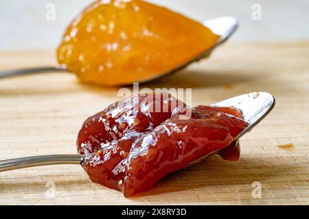 Spreadable Fruit with Mango, Raspberry, Pomegranate and Pineapple on Spoon. Ready to eat. Stock Photo