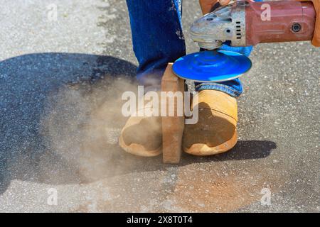 Preparation of paving bricks stones for installation using circular diamond disc saws Stock Photo