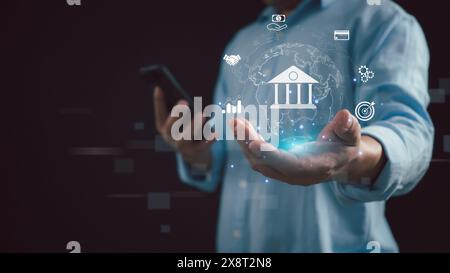 Businessman showing icon online banking and icon network connection, Technology and business finance concept, online payments, shopping and digital te Stock Photo