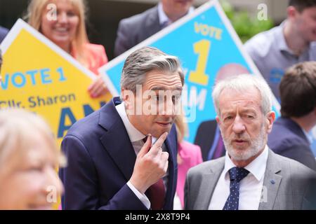 Taoiseach and Fine Gael leader Simon Harris (centre) poses with European local election candidates following a launch event for his party's European and local election manifestos in Dublin. Picture date: Monday May 27, 2024. Stock Photo