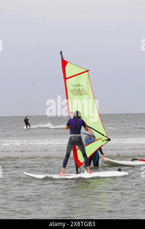 Kitesurf World Cup 2009, Sankt Peter-Ording, Nordfriesland, Schleswig-Holstein, Germany, Europe, person windsurfing on calm sea Stock Photo