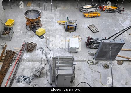 Construction site Construction material Concrete buckets and reinforcing bars Stock Photo