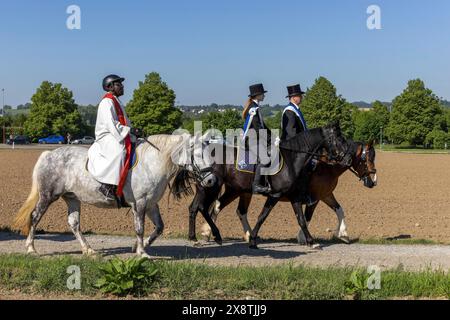 A priest at the equestrian procession Blood Ride in Weingarten on ...