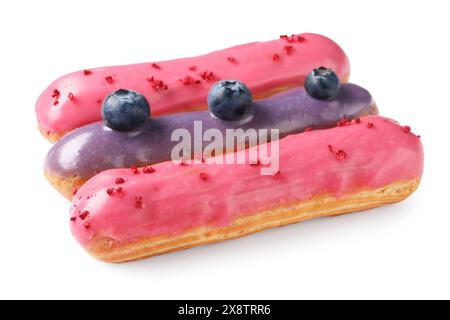 Delicious eclairs covered with glaze isolated on white Stock Photo