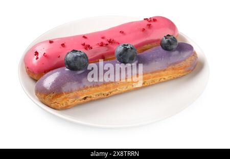 Delicious eclairs covered with glaze isolated on white Stock Photo
