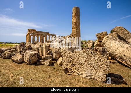 The ruins of the ancient Greek Temple F with the Temple of Hera in the background, Selinunte, Sicily Stock Photo