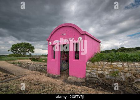 Pink ferry Shelter for the Warsash to Hamble ferry on the river hamble, Hampshire. Stock Photo