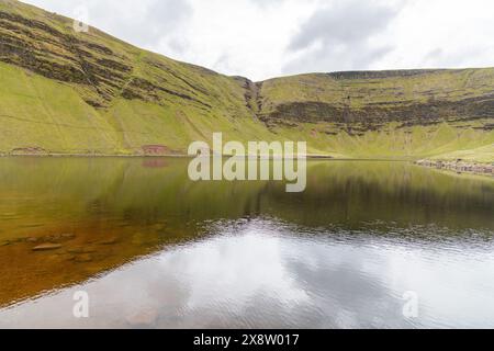 View of Llyn y Fan Fach glacial lake at the peak of Picws Du mountain in the Brecon Beacons in Wales, UK Stock Photo