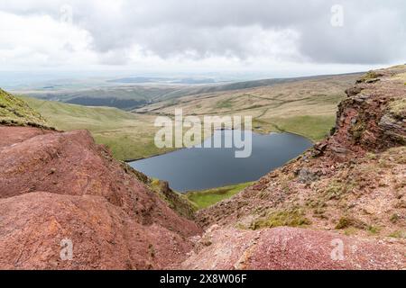 View of Llyn y Fan Fach glacial lake at the peak of Picws Du mountain in the Brecon Beacons in Wales, UK Stock Photo