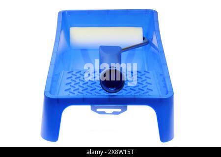 paint roller in paint tray isolated on white background Stock Photo