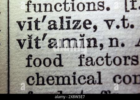 Word vitamin on dictionary page, macro close-up Stock Photo