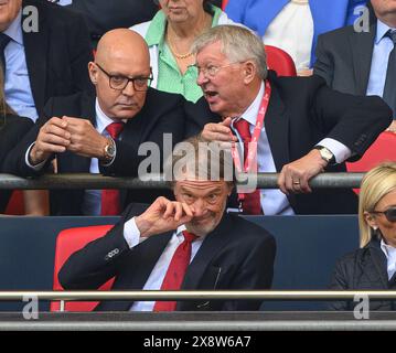 London, UK. 25th May, 2024  - Manchester City v Manchester United v - FA Cup Final - Wembley.                                                            Manchester United co-owner Sir Jim Ratcliffe, Sir Alex Ferguson and David Brailsford watch on during the FA Cup Final.                             Picture Credit: Mark Pain / Alamy Live News Stock Photo