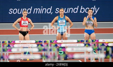 Verena Mayr of Austria, Saga Vanninen of Finland and Yuliya Loban of Ukraine competing in the 60m hurdle pentathlon at the World Athletics Indoor Cham Stock Photo