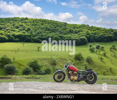 Amazing view of Turda Gorge (Cheile Turzii) natural reserve with motorcycle on parking. Location: near Turda close to Cluj-Napoca, in Transylvania, Ro Stock Photo