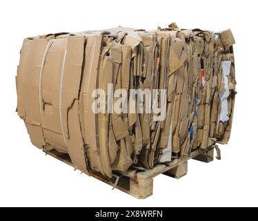 A pile of cardboard boxes stacked on top of each other on a pallet for recycling. Boxes of different sizes and colors. Stock Photo