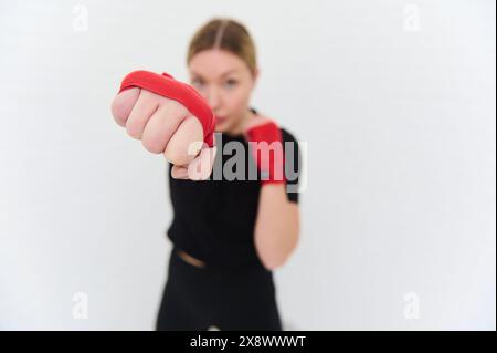 Young female boxer, forward punch Stock Photo - Alamy