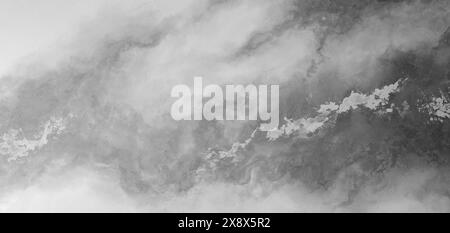 A grey and white painting of a cloudy sky with a grey line running through it. The painting has a moody and somber feel to it, as if it is trying to c Stock Photo