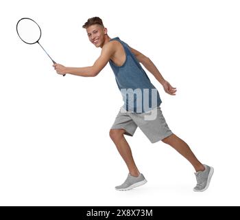 Young man playing badminton with racket on white background Stock Photo