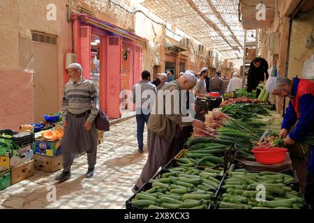 Vegetable and fruit sellers in Ghardaia market. Mazb Valley.Ghardaia Province.North Sahara.Algeria Stock Photo