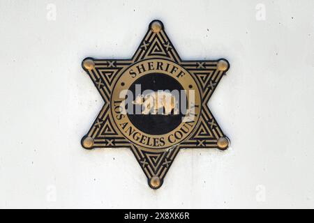 A Los Angeles County Sheriff emblem logo on a sign at the Sherman Block Los Angeles County Sheriff's Department Headquarters building, Monday, May 27, 2024, in Los Angeles. Stock Photo