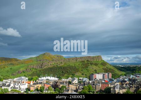 Edinburgh, UK. 27th May, 2024. UK A view looking from Carlton Hill over towards Arthurs Seat, Scottish Parliament (bottom left) and Dynamic Earth (centre) Pic Credit: phil wilkinson/Alamy Live News Stock Photo