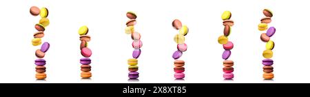 Set of flying french colorful macaroons isolated on white background. Stock Photo