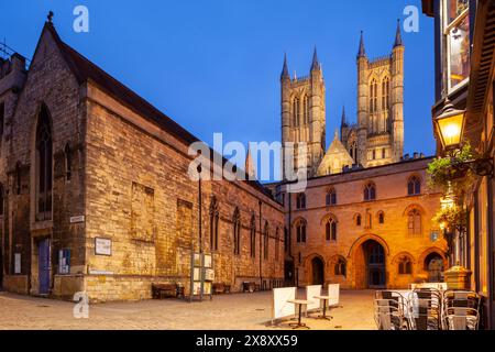 Night falls at the Exchequer Gate in front of Lincoln cathedral, Lincoln, England. Stock Photo