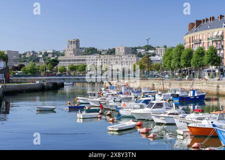 The Roy Basin with small fishing boats at anchor and in the background buildings typical of the reconstruction of the city after the Second World War. Stock Photo