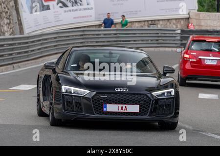 Monte Carlo, Monaco - View on a black Audi R8 V10 Plus driving on the road in the Fairmont Hairpin. Stock Photo