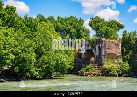 The ruins of  Pons Aemilius the oldest Roman stone bridge in Rome, preceded by a wooden version, it was rebuilt in stone in the 2nd century BC. Today is called also Ponte Rotto (Broken Bridge) - Rome, Italy Stock Photo