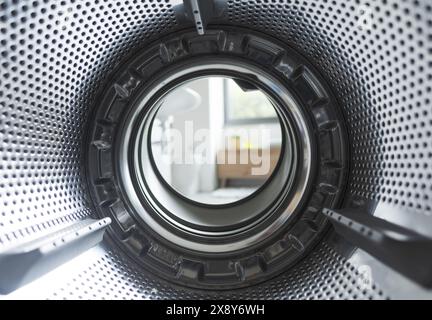 Empty clean washing machine drum, view from the inside of the appliance Stock Photo