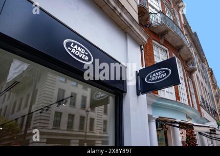 Land Rover Advertising logo, banner, car dealership building, British Rolls-Royce Motor Cars automobile manufacturer auto salon, Sales Office, corpora Stock Photo