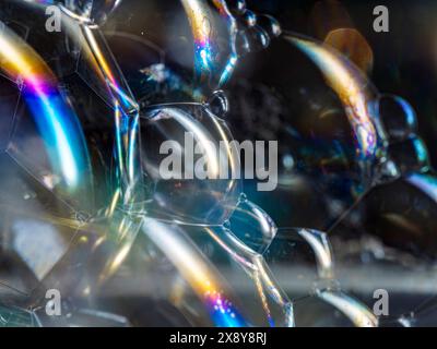 Abstract white soap foam bubbles texture background. Bubble texture isolated on black background for composition. Close-up photo. Stock Photo