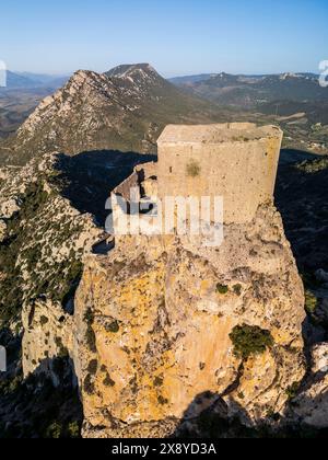 France, Aude, Cathar country, the castle of Quéribus on its rocky spur at 728 m and the castle of Peyrepertuse in the background (aerial view) Stock Photo