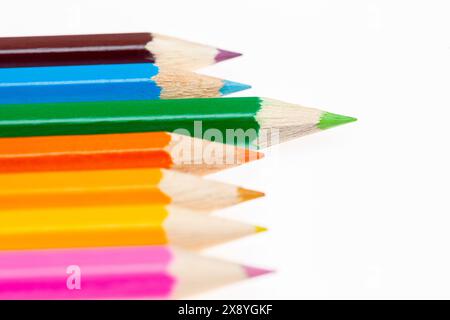 A collection of Coloured pencils on white background Stock Photo