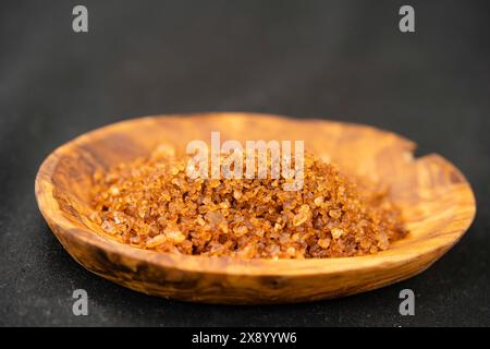Fleur de sel in a wooden bowl Stock Photo