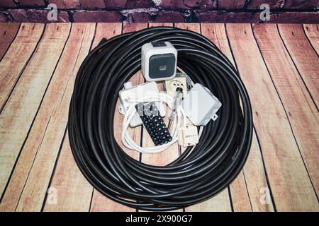 Power cable, junction box, socket outlet and switch, symbol image for electricians Stock Photo
