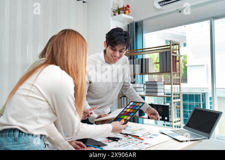 Asian business creative team work together, mobile application software design project. Brainstorm meeting, internet technology Stock Photo