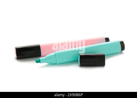 Open blue and pink highlighters isolated on white background. Top view Stock Photo