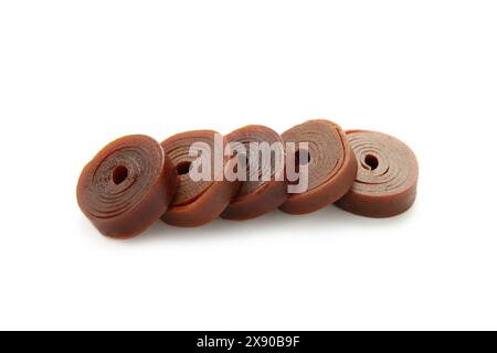 Fruit pastille isolated on a white background. Fruit roll-ups made from raspberry, apples and currant. Top view Stock Photo