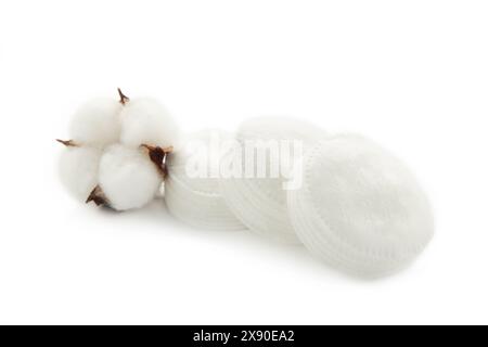 Make up cotton pad stack pack with flower isolated on background. Top view Stock Photo