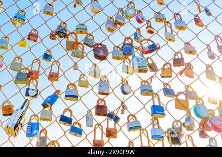 Los Angeles, California - December 29, 2022: Fence adorned with numerous locks of love at Runyon Canyon Stock Photo