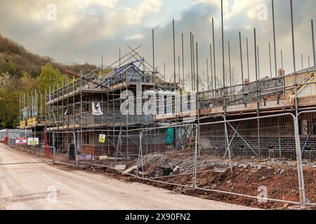 Scaffolding on new build housing estate, Llanfoist, Wales, UK Stock Photo