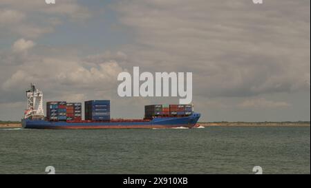 Calshot, Hampshire, UK. May 24, 2024. Cargo ship Spica J sails on the Solent from Southampton past calshot en route to Le Havre, France. Stock Photo