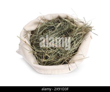 Dried hay in burlap sack isolated on white Stock Photo