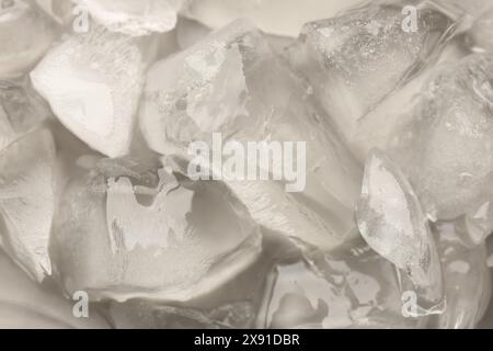 Pieces of crushed ice as background, closeup Stock Photo