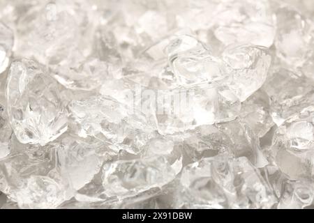 Pieces of crushed ice as background, closeup Stock Photo