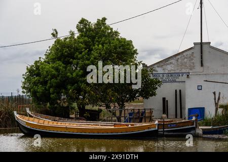 El Palmar, Spain - March 24, 2024: Traditional wooden boats in the village of El Palmar in Natural Park Albufera Stock Photo