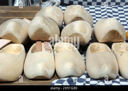 Dutch wooden clogs on display at a street market in Holland. Alkmaar, Netherlands Stock Photo